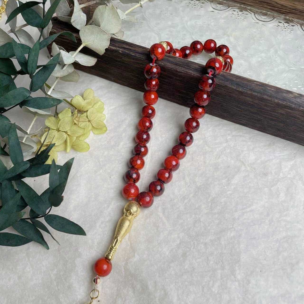 33-piece Gold Tassel Glass Bracelet With 10mm Large Flower Beads 📿                                                               . 33-delige gouden armband met kwastjes en glazen kralen, inclusief grote bloemkralen van 10 mm📿