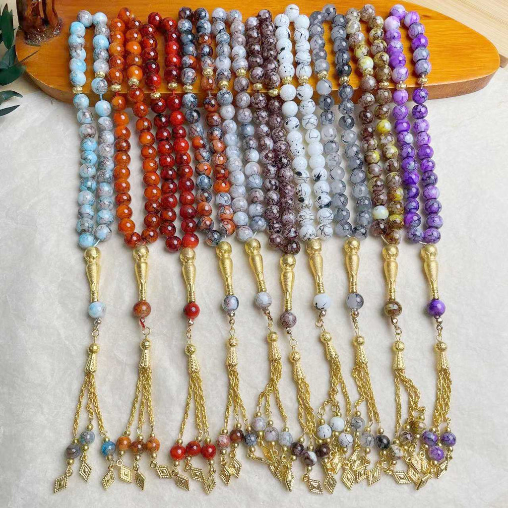 33-piece Gold Tassel Glass Bracelet With 10mm Large Flower Beads 📿                                                               . 33-delige gouden armband met kwastjes en glazen kralen, inclusief grote bloemkralen van 10 mm📿