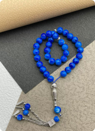 33-piece Gold Tassel Glass Bracelet With 10mm Large Flower Beads 📿                                                               . 33-delige gouden armband met kwastjes en glazen kralen, inclusief grote bloemkralen van 10 mm📿