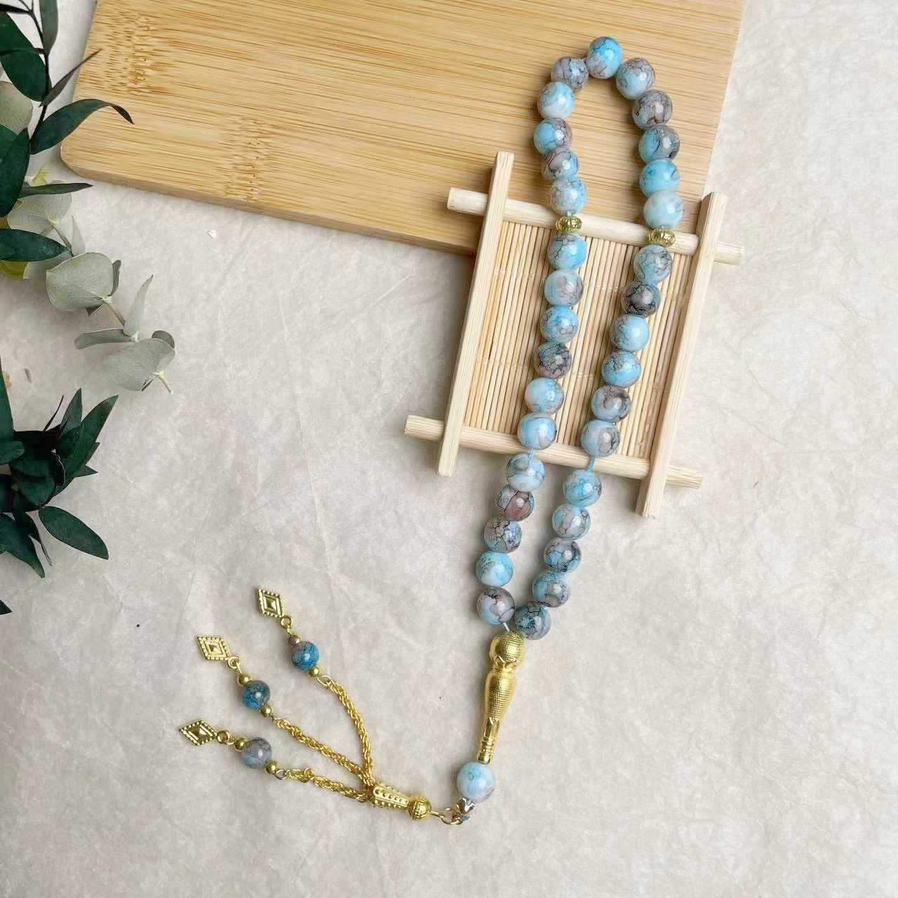 33-piece Gold Tassel Glass Bracelet With 10mm Large Flower Beads 📿                                                               . 33-delige gouden armband met kwastjes en glazen kralen, inclusief grote bloemkralen van 10 mm📿